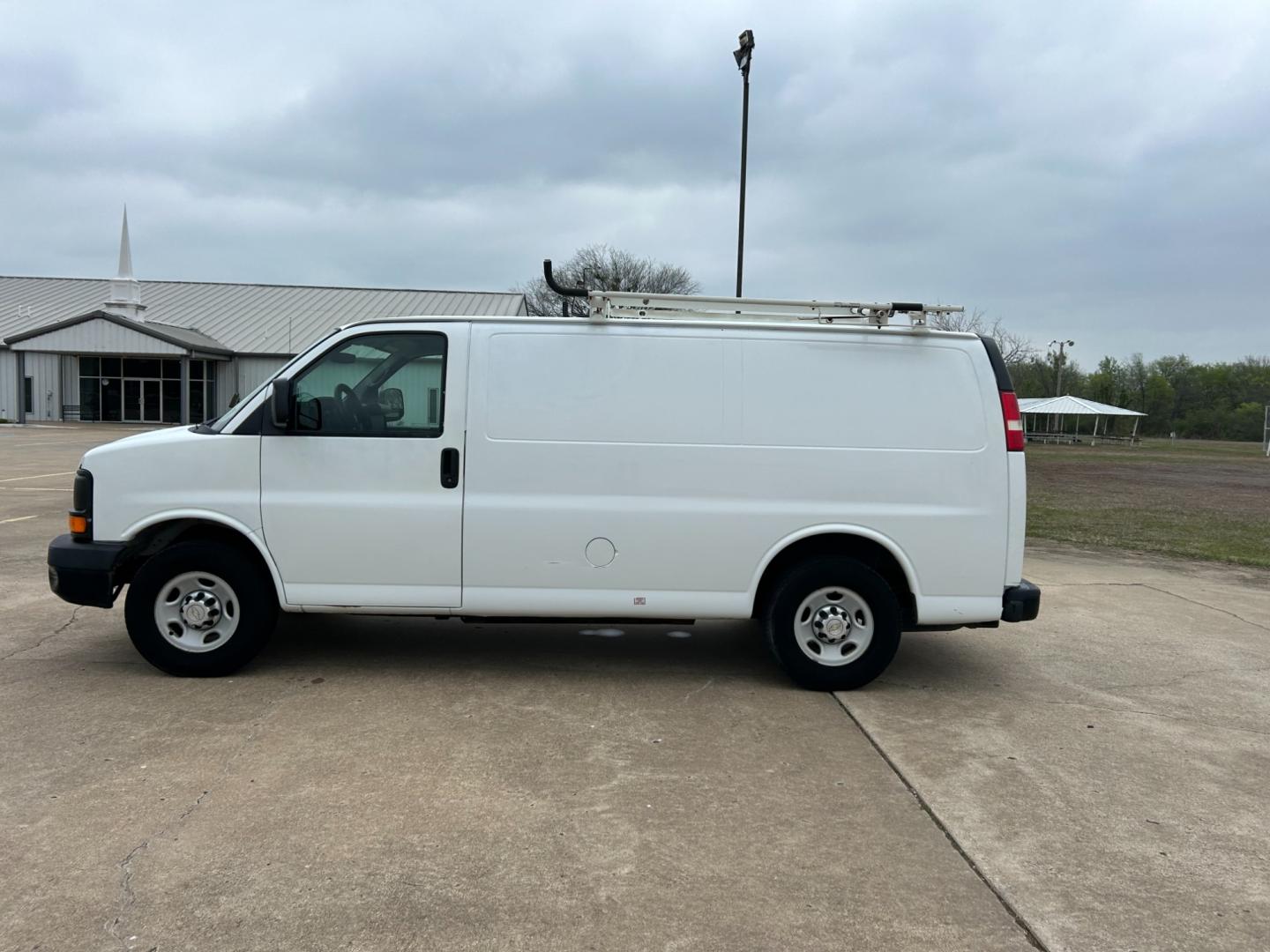 2011 White /Gray Chevrolet Express 2500 Cargo (1GCWGFCB9B1) with an 6.0L V8 DOHC 16V engine, 4-Speed Automatic transmission, located at 17760 Hwy 62, Morris, OK, 74445, (918) 733-4887, 35.609104, -95.877060 - Photo#7